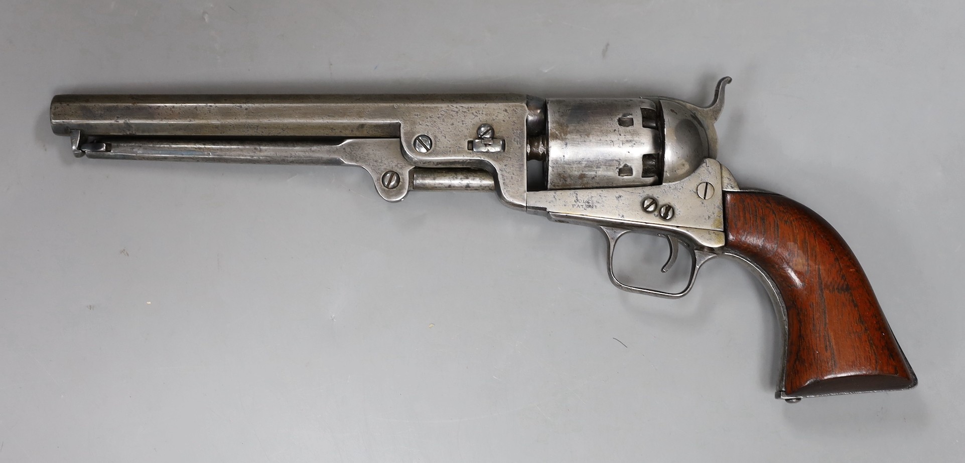 A Colt Patent revolver, under barrel loading, six shot, 7.5 inch octagonal barrel